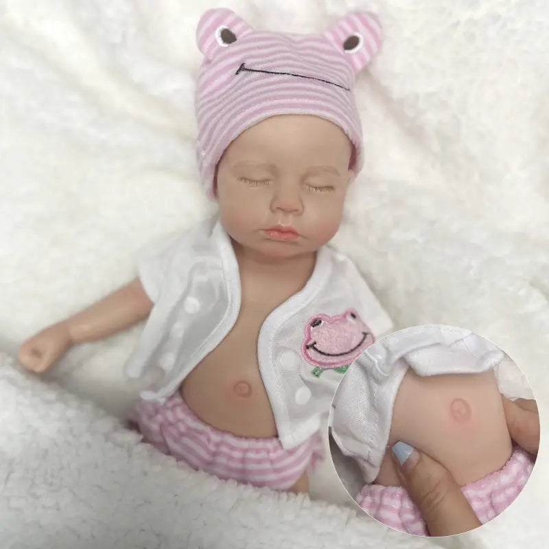 Bambola reborn 31cm occhi chiusi 100% silicone morbido -