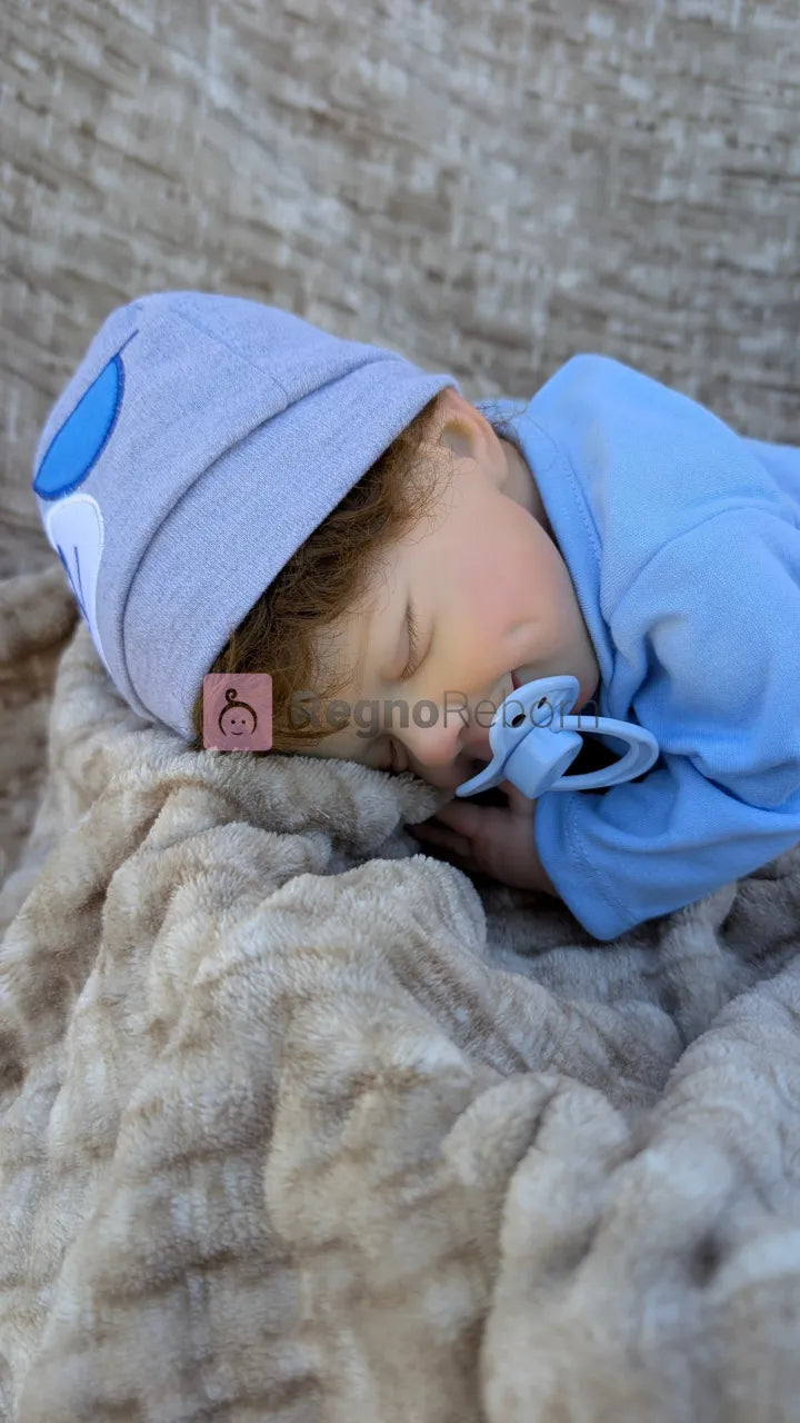 bambola-reborn-addormentata-a-pancia-in-giu-con-ciuccio-che-sembra-vera-2