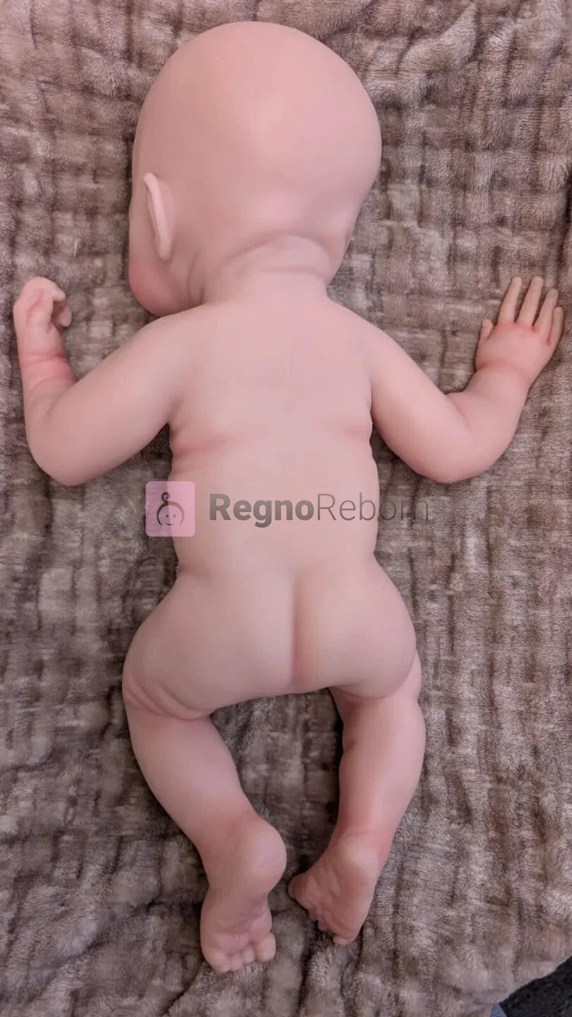 bambola reborn full silicone che pesa 3.5kg che è nuda vista posteriore
