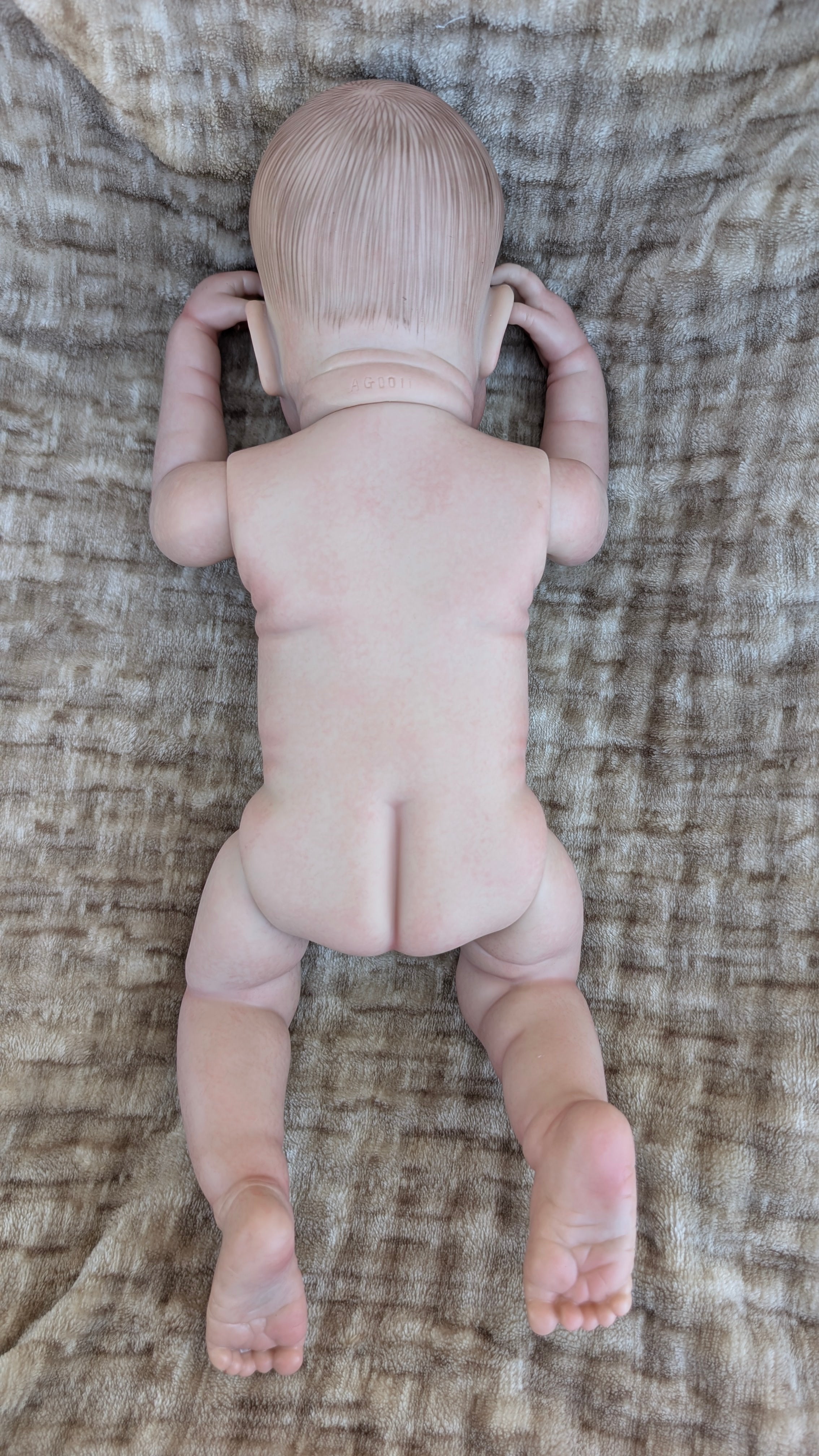 bambola-reborn-maschio-nuda-vista-dietro
