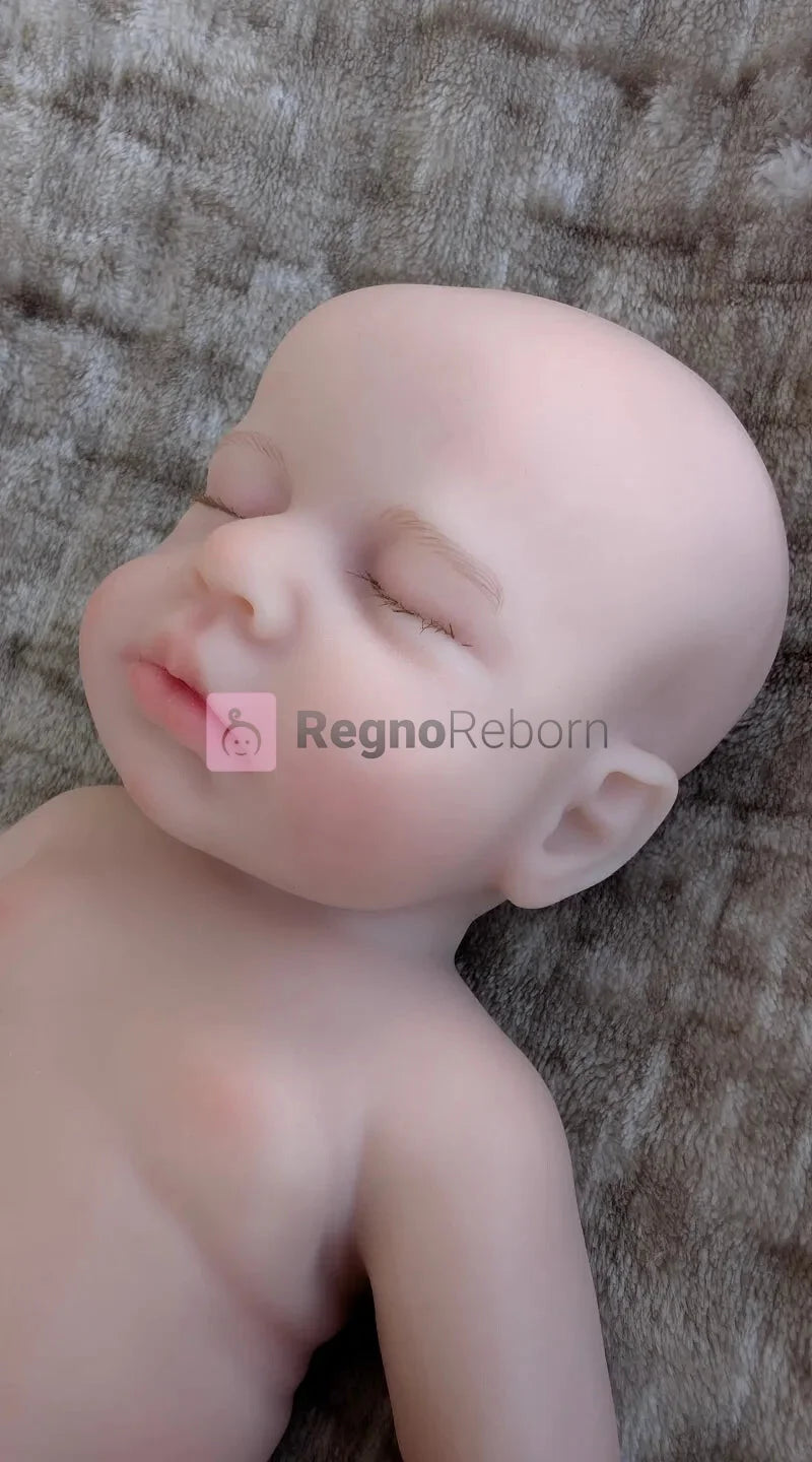 bambola-reborn-prematura-addormentata-viso-realistico-32cm