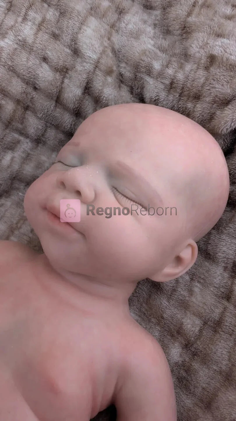 viso ultra realistico della neonata reborn che dorme