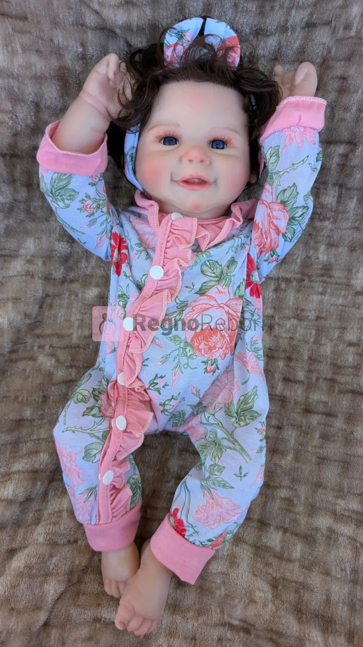 Bambola-reborn-femminuccia-occhi-aperti-sdraiata-schiena