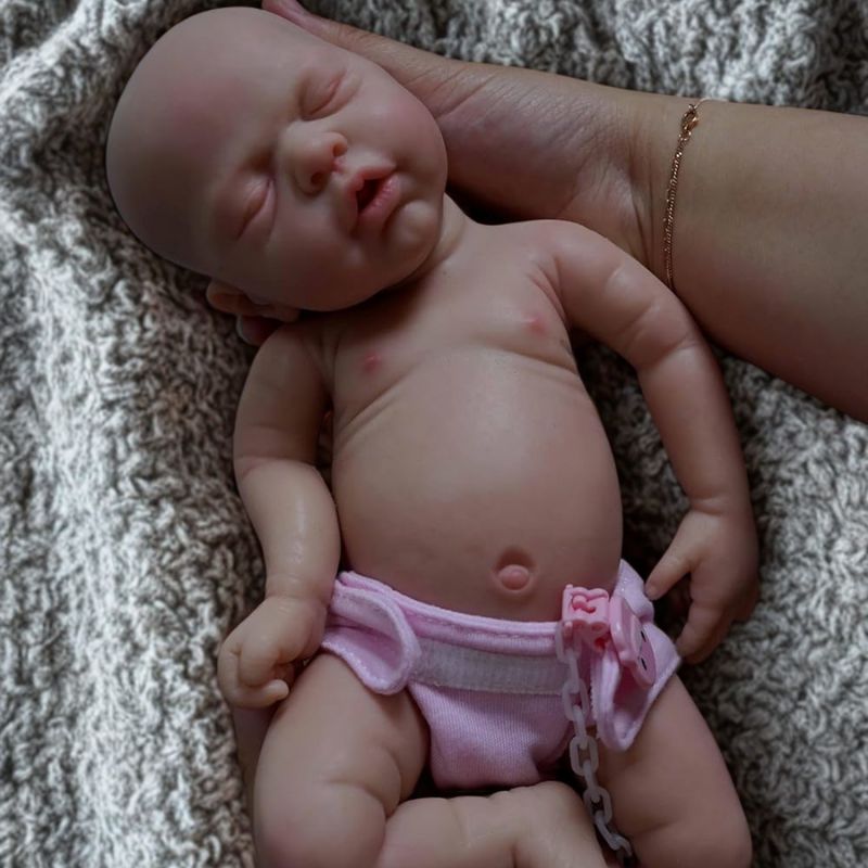Bambola-reborn-prematura-addormentata-32cm-occhi-chiusi-NOVA