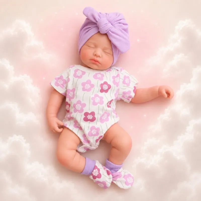 bambola reborn femmina di 50cm per 3.1kg con gli occhi chiusi e il corpo tutto in silicone morbidissimo