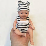 bambola reborn da adottare con vestiti da neonato