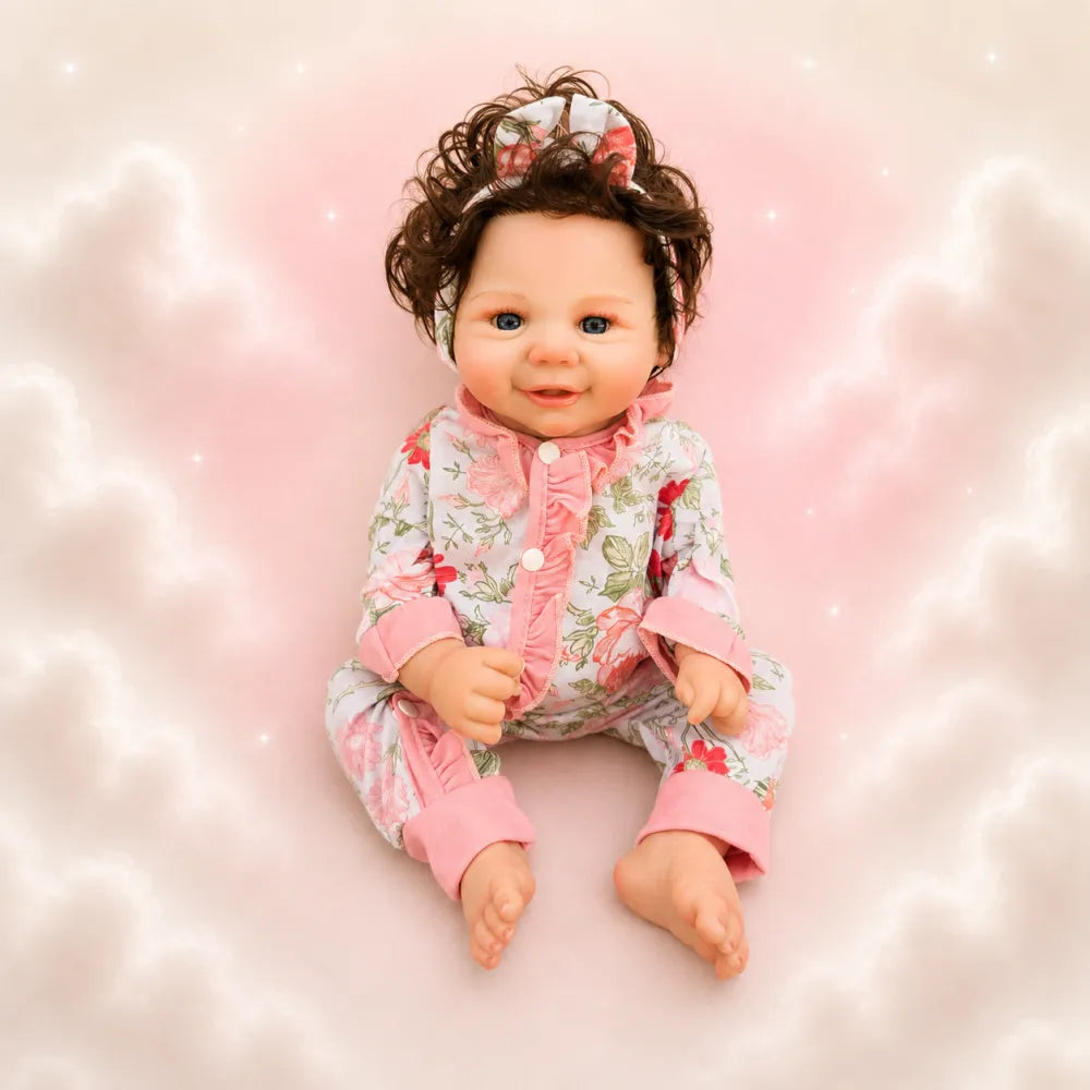 bambola-reborn-femmina-sorridente-capelli-lunghi-pigiama-neonato