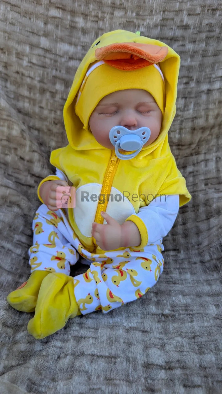 bambolotto-reborn-addormentato-seduto-ciuccio-bocca