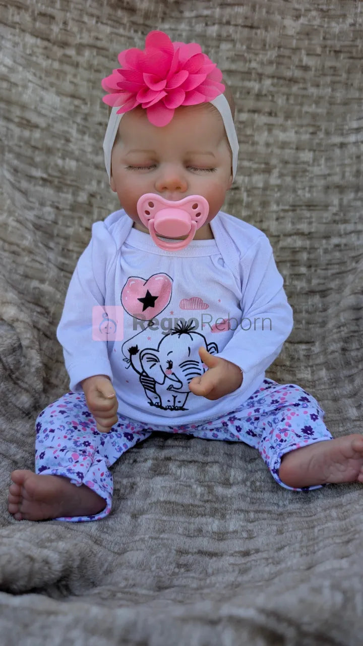 neonata-reborn-occhi-chiusi-con-ciuccio