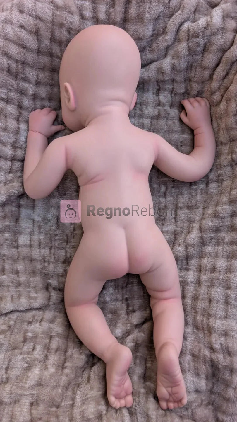 Grande neonato reborn nudo con il corpo tutto in silicone morbido 50 cm visto da dietro