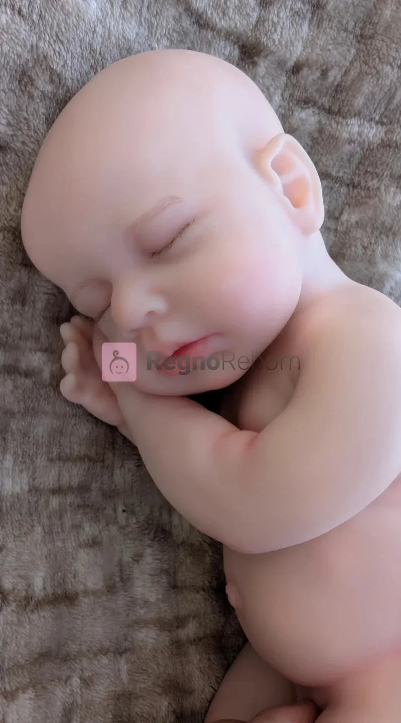 prematuro-reborn-occhi-chiusi-posizione-neonato-mani_sotto-testa